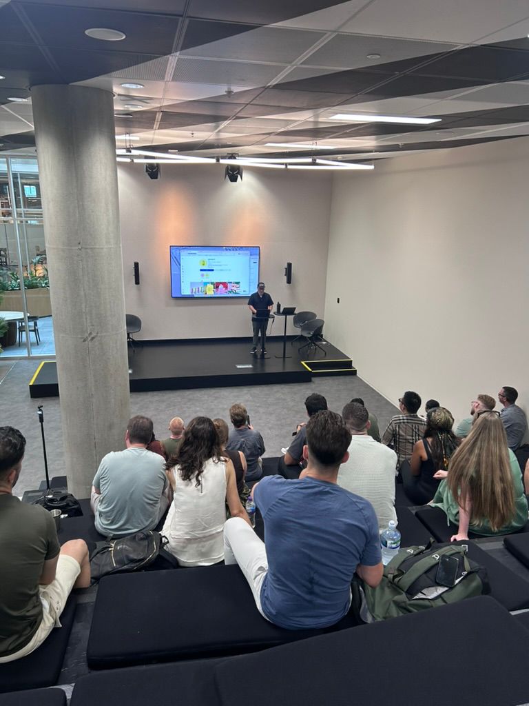 Business owners working together at a Build Along with AI session